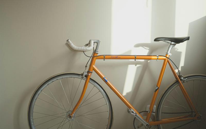 Find your perfect fit at Portico Kirby a bicycle parked in a room
