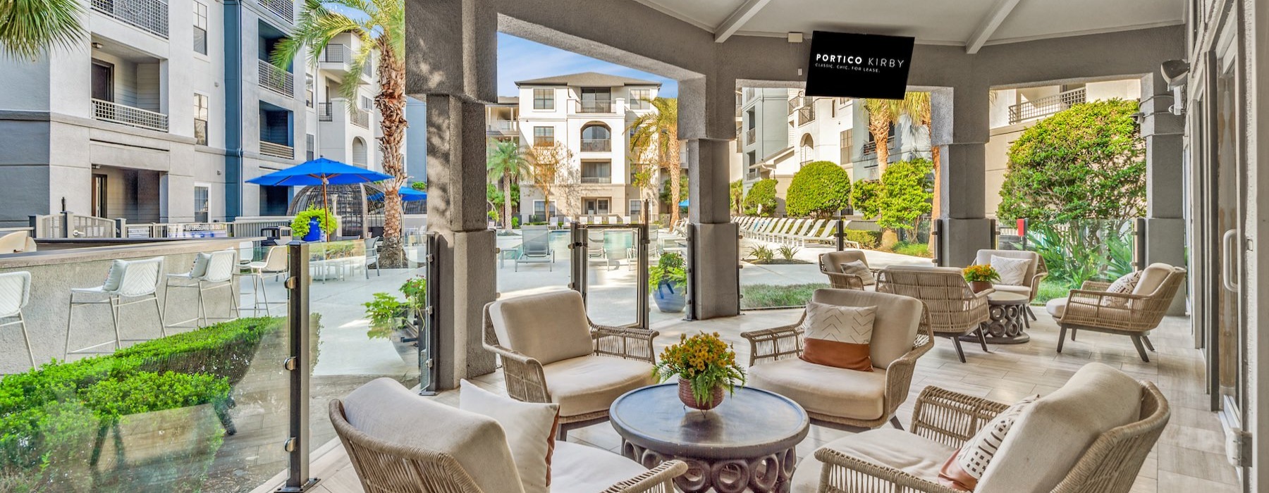 a patio with chairs and tables