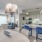 a large kitchen with a dining table